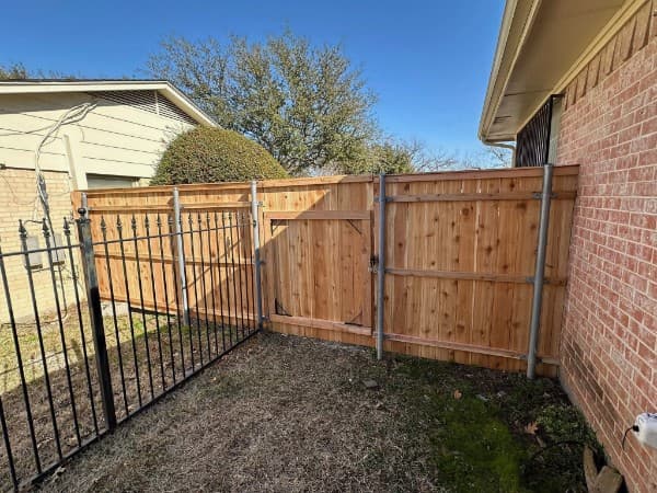 Professional fencing services by The Roofing Couple